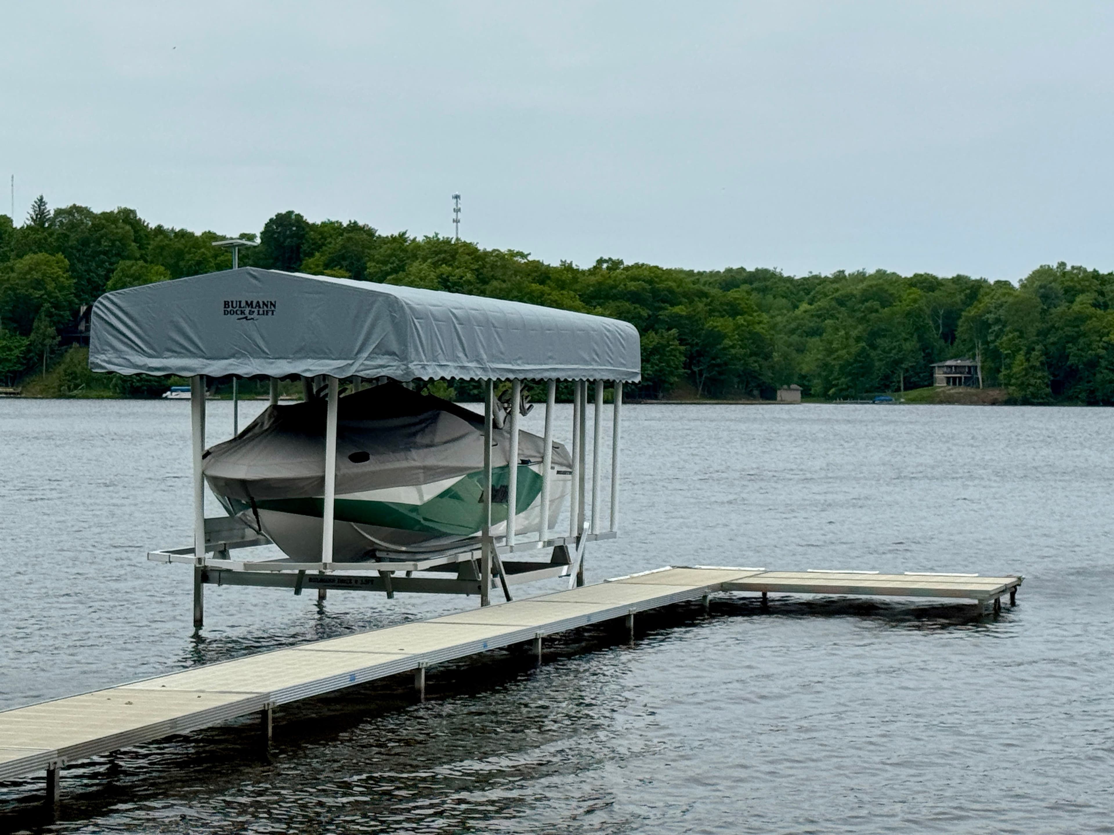 Bulmann boat lift in Ludington with a Malibu wakeboat from Gull Lake Marine