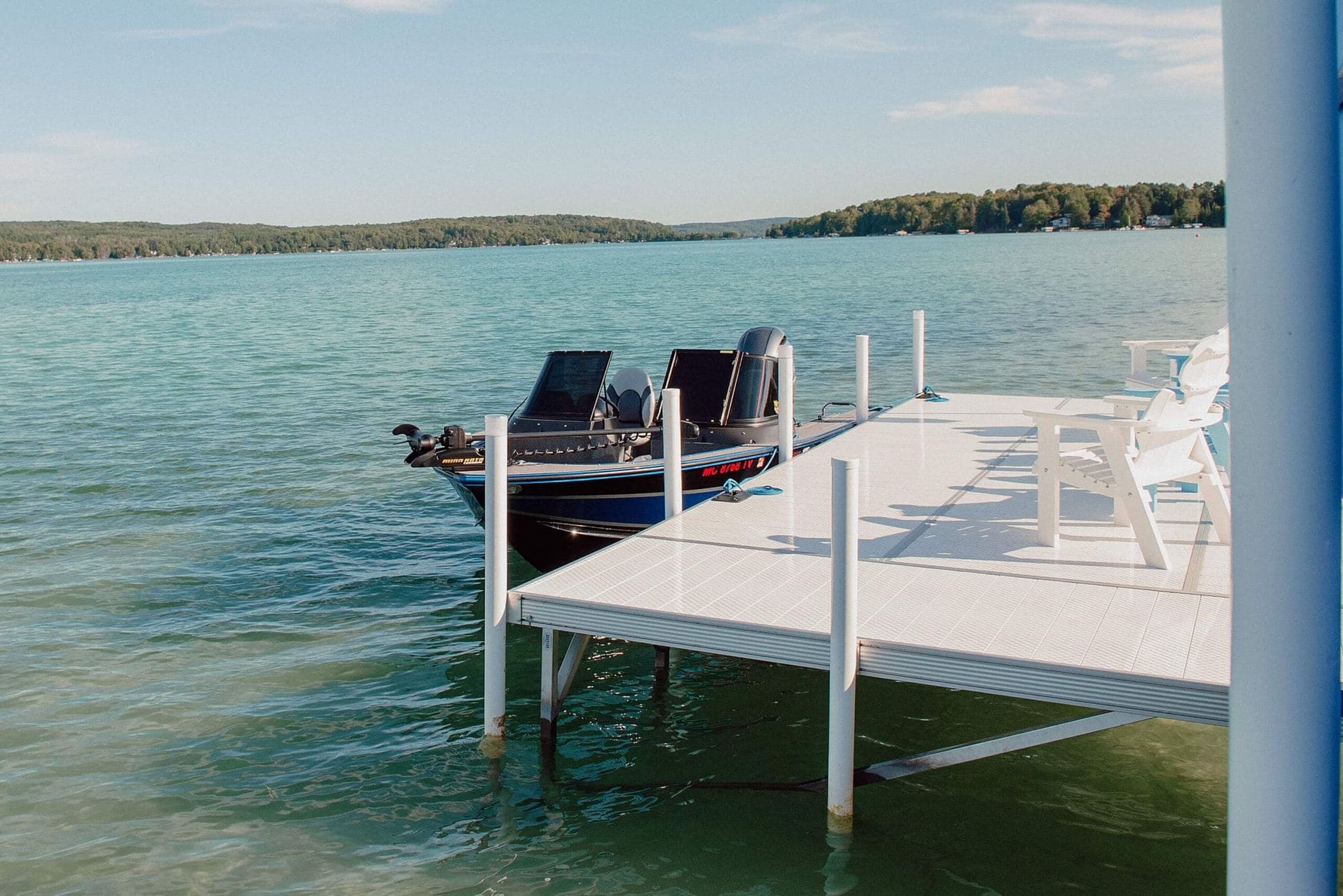 Bulmann dock and fishing boat on a lake in West Michigan
